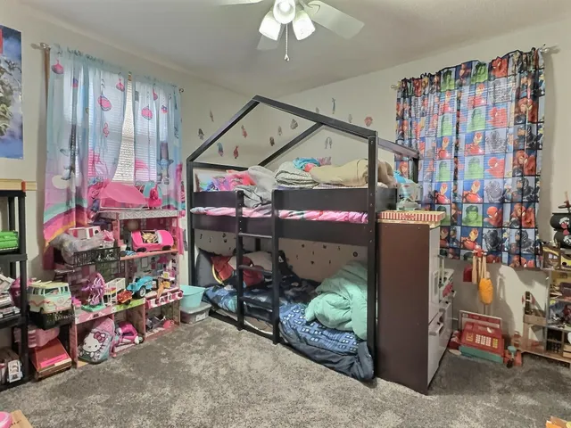 a bathroom with a sink vanity mirror and shower