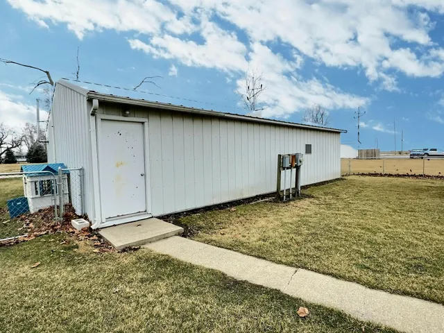 a house view with a backyard space
