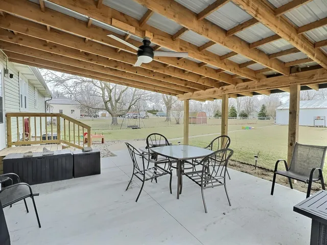 a view of backyard with deck