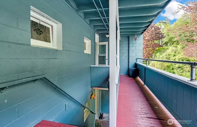 a balcony with view of city