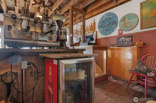 a stove top oven sitting inside of a kitchen