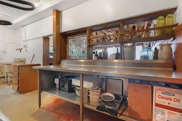 a view of a garage with a table and chairs