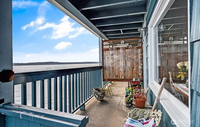 a view of a porch with furniture