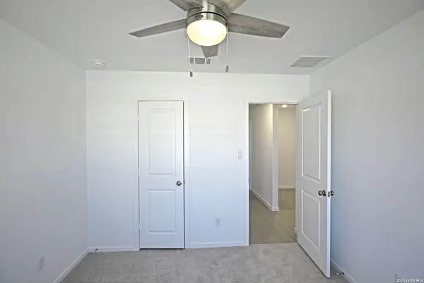 a white bath tub with a shower