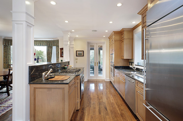 616 Ridge Road Winnetka, IL 60093 - Photo 5 of 23 a large kitchen with a large window