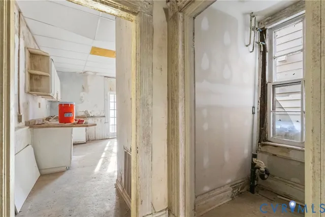 a view of a bathroom from a hallway