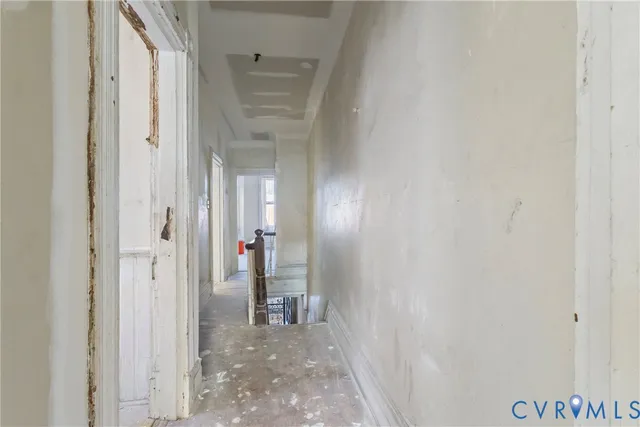 a view of a bathroom from a hallway