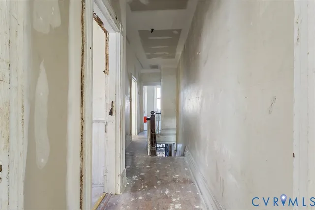 an empty room with windows