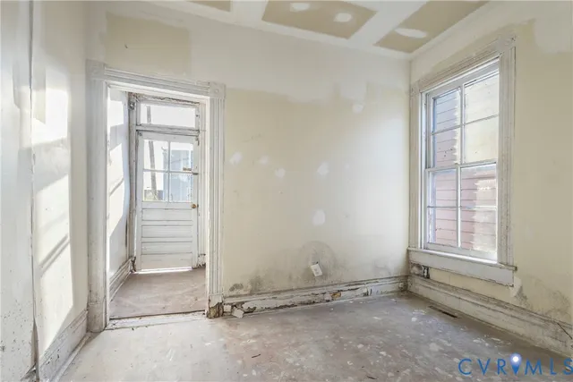 an empty room with windows