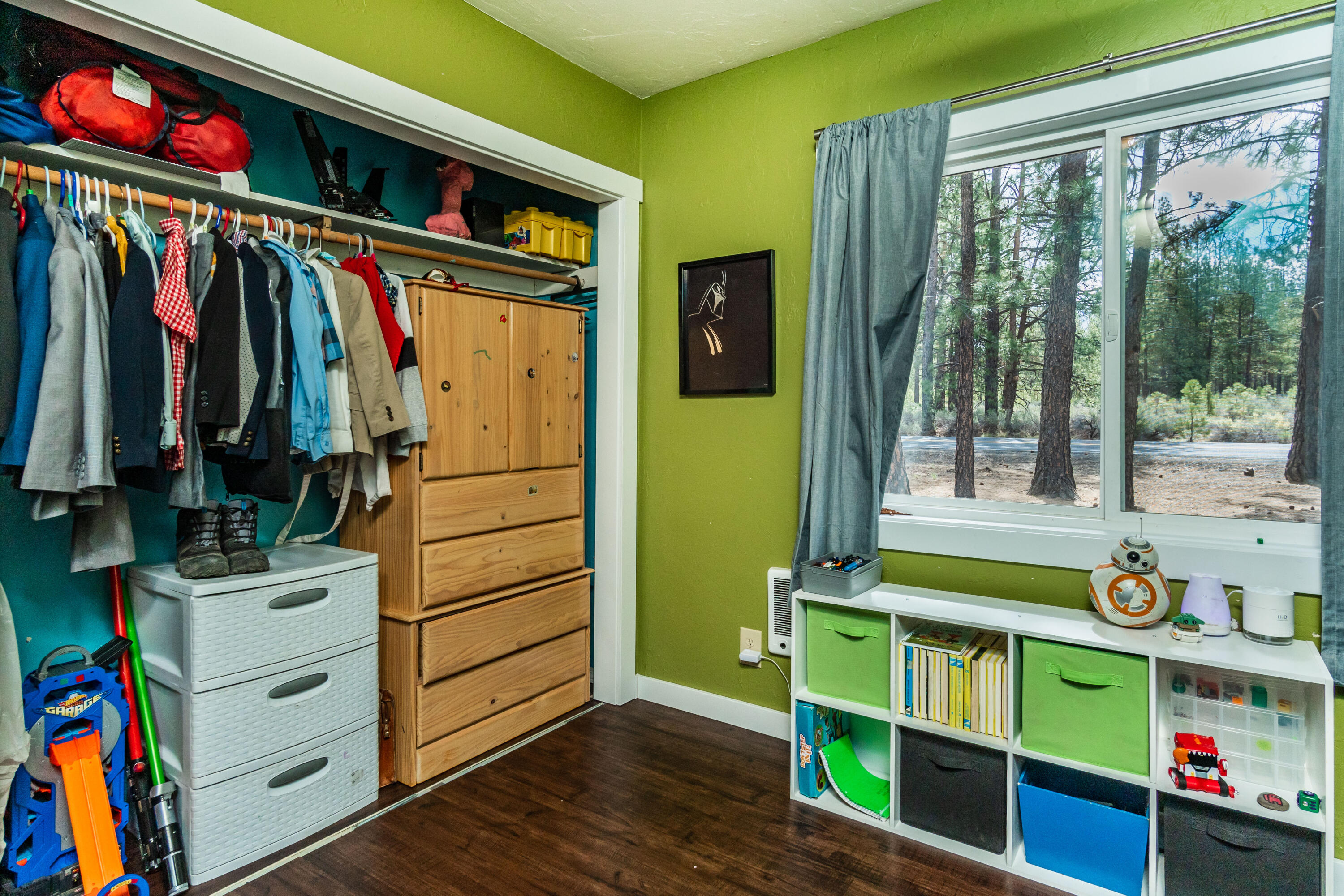 60193 Cheyenne Road Bend, OR 97702 - Photo 15 of 29 a view of walk in closet with clothes and shoes