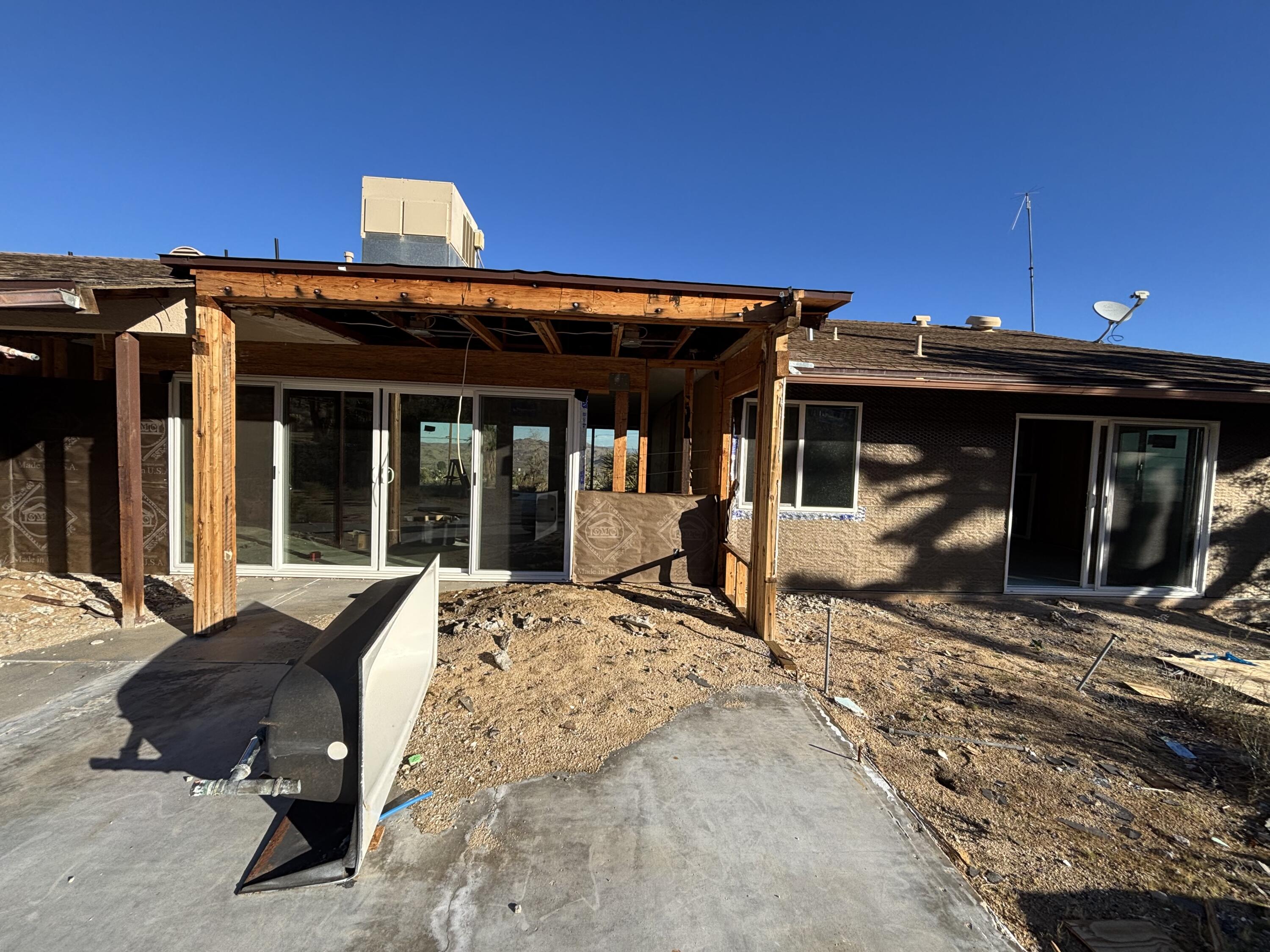 60959 Prescott Trail Joshua Tree, CA 92252 - Photo 25 of 30 a view of a lounge chairs in the patio