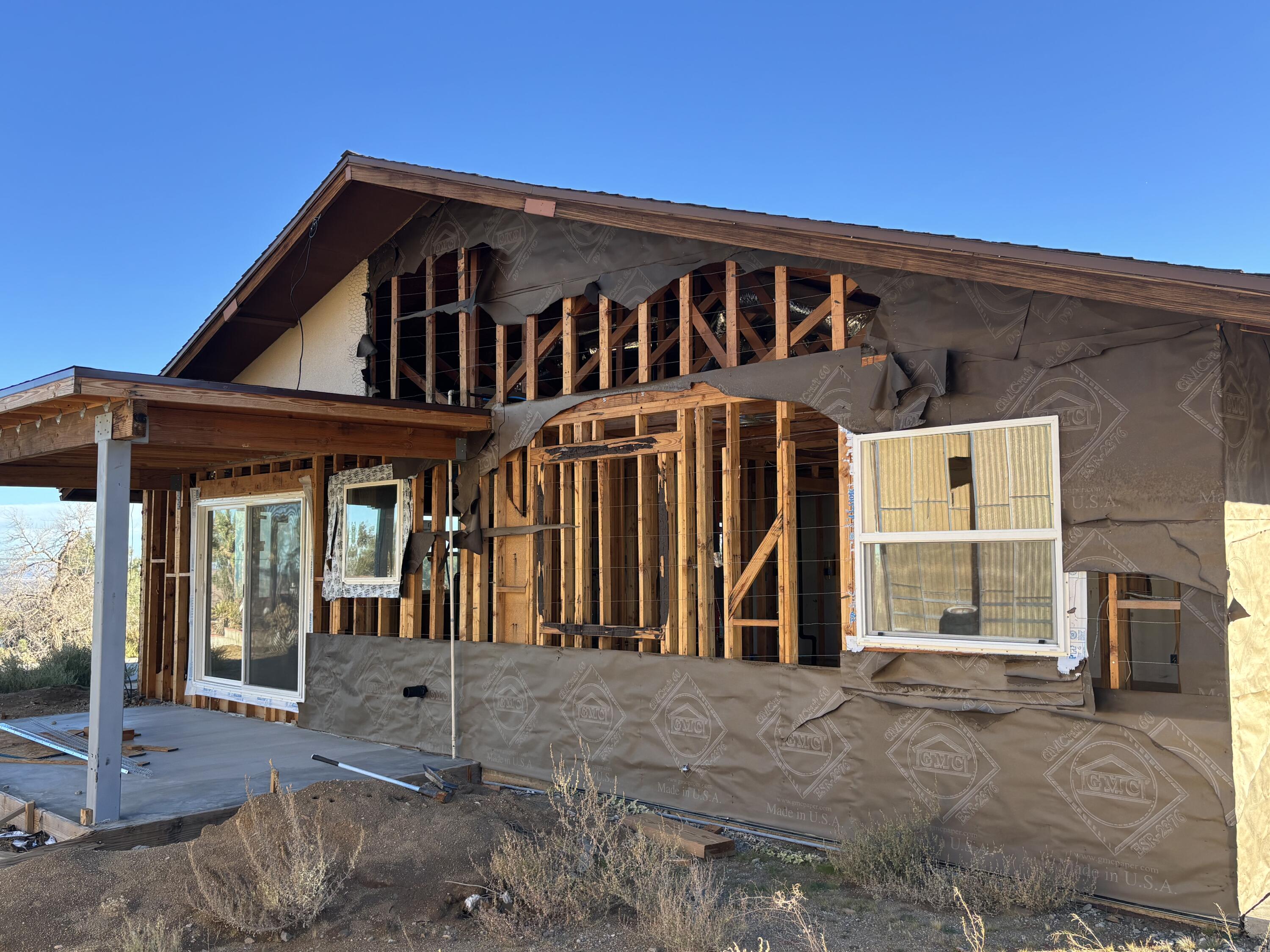 60959 Prescott Trail Joshua Tree, CA 92252 - Photo 30 of 30 a front view of a house with a porch