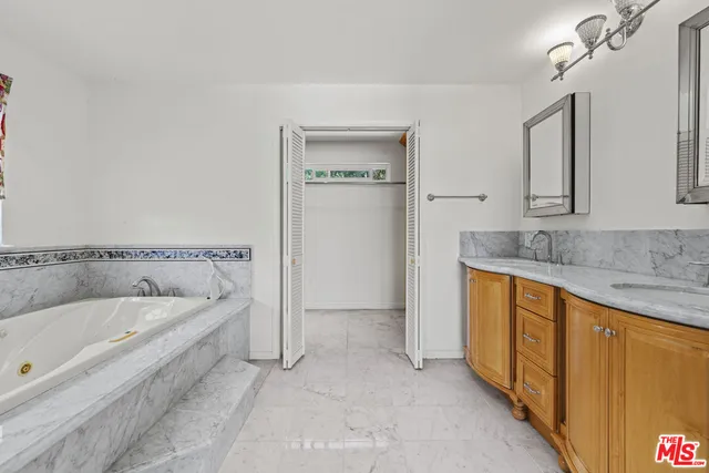 a view of a balcony with a floor to ceiling window