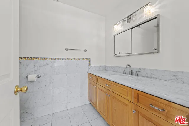 a view of an empty room with glass door