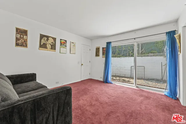 an empty room with a fireplace