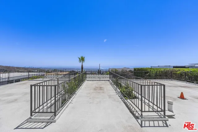 a view of a terrace with sitting area