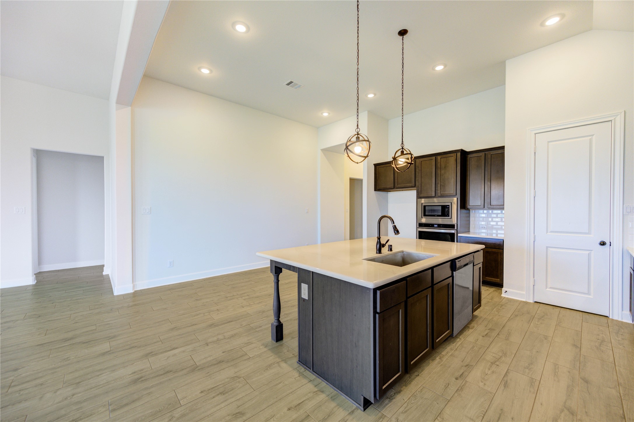 191 Abner Lane Montgomery, TX 77356 - Photo 17 of 49 a kitchen with a sink and stove