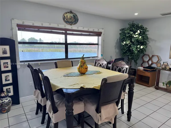 a bedroom with a bed and a rug