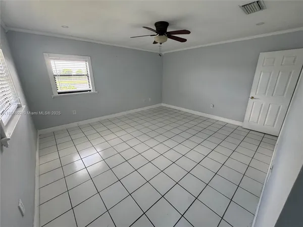 a view of balcony with furniture and garden