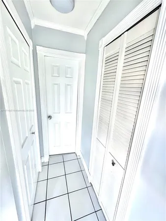 a view of balcony with wooden floor