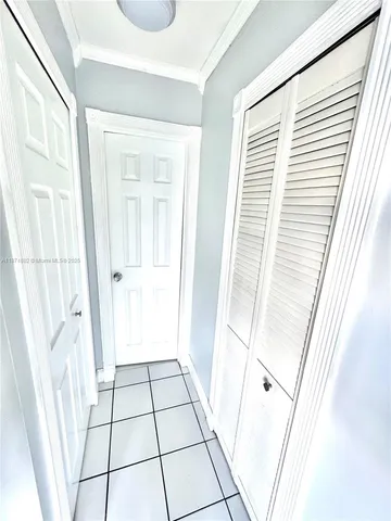 a view of balcony with wooden floor