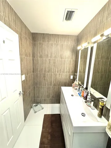 a view of a lake with a big yard