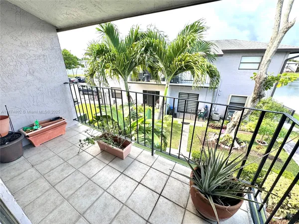 a bathroom with a sink toilet and mirror
