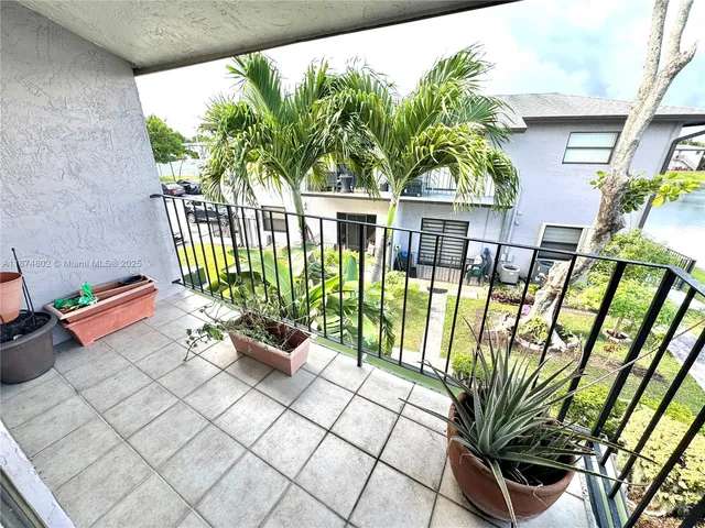 a bathroom with a sink toilet and mirror