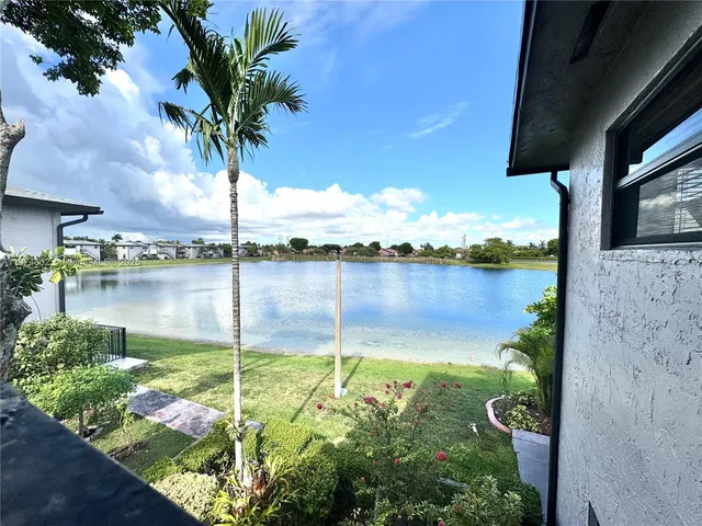 a view of a house with a back yard