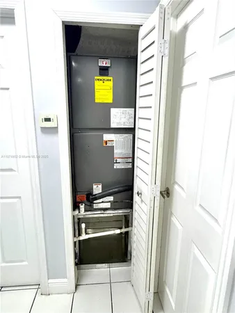 a view of a lake with a house in the background