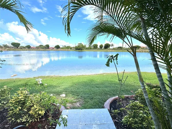 a view of a back yard of the house
