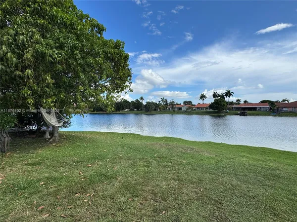 a view of a lake with a city