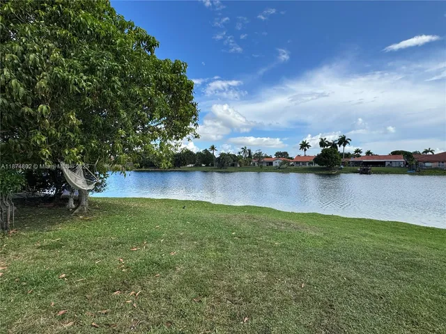 a view of a lake with a city