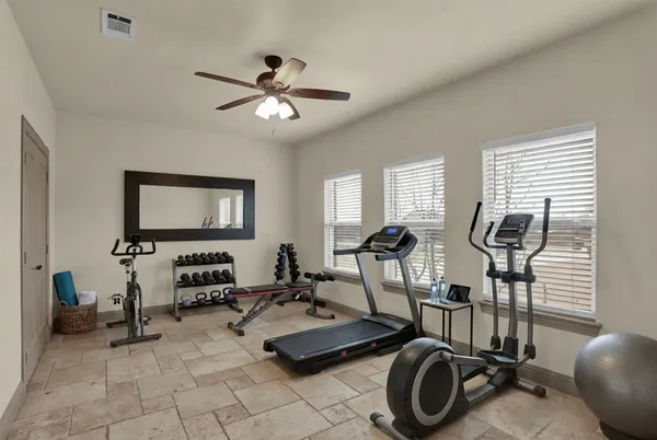a view of a room with gym equipment