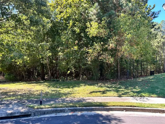 a view of swimming pool with a yard