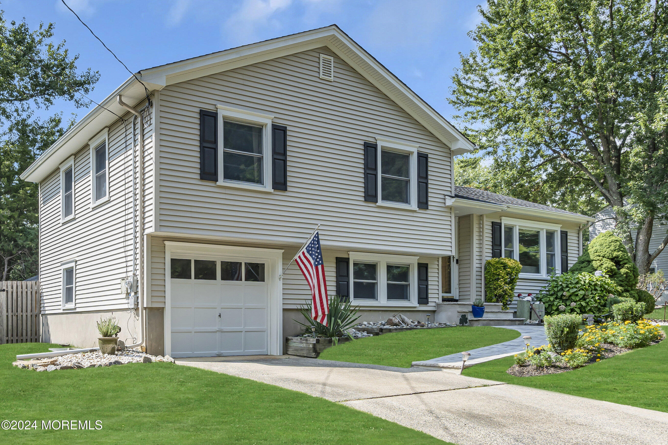 111 Remsen Mill Road Neptune Township, NJ 07753 - Photo 2 of 80 a front view of a house with a yard