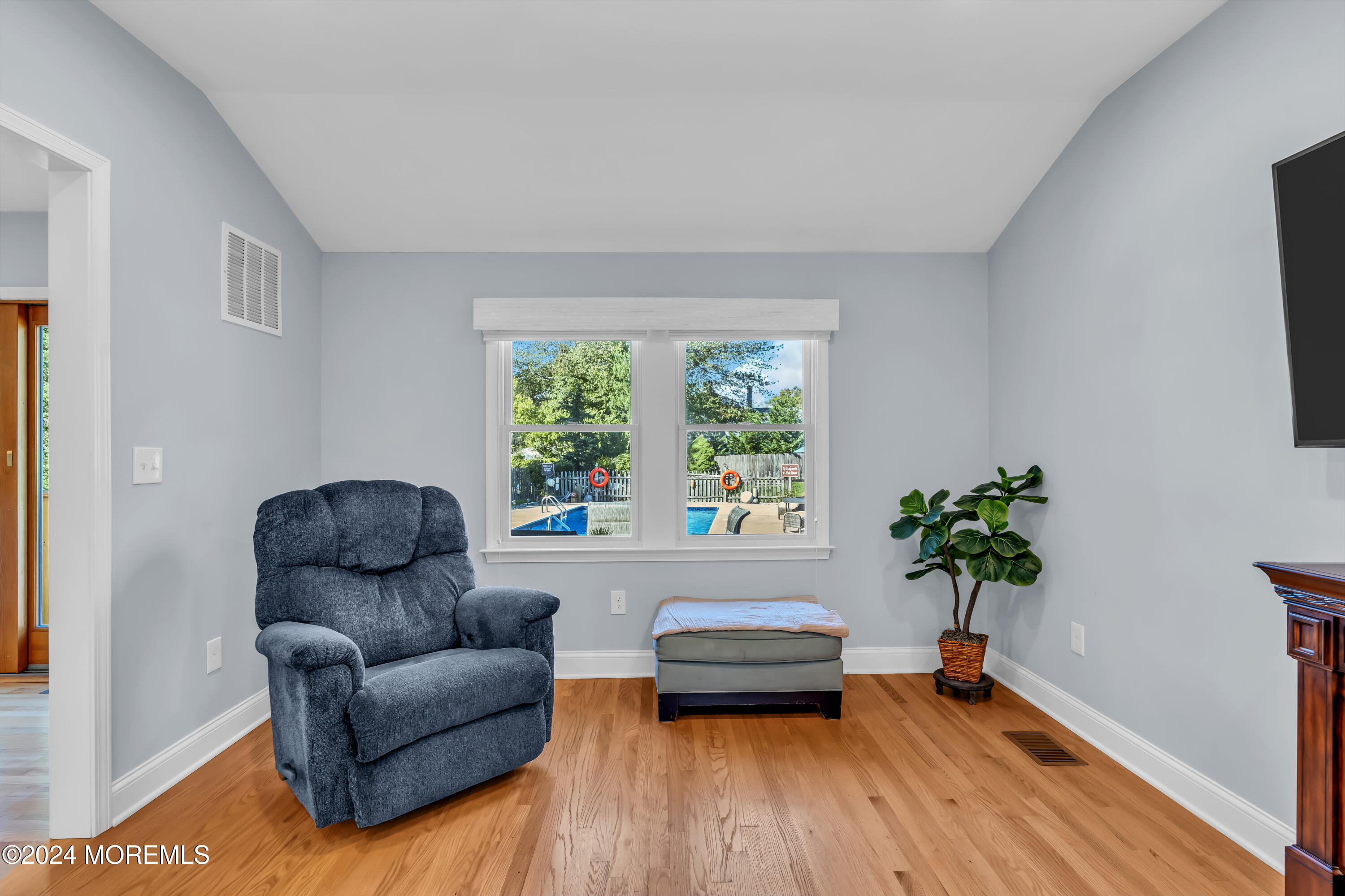 111 Remsen Mill Road Neptune Township, NJ 07753 - Photo 24 of 80 a living room with furniture and a potted plant