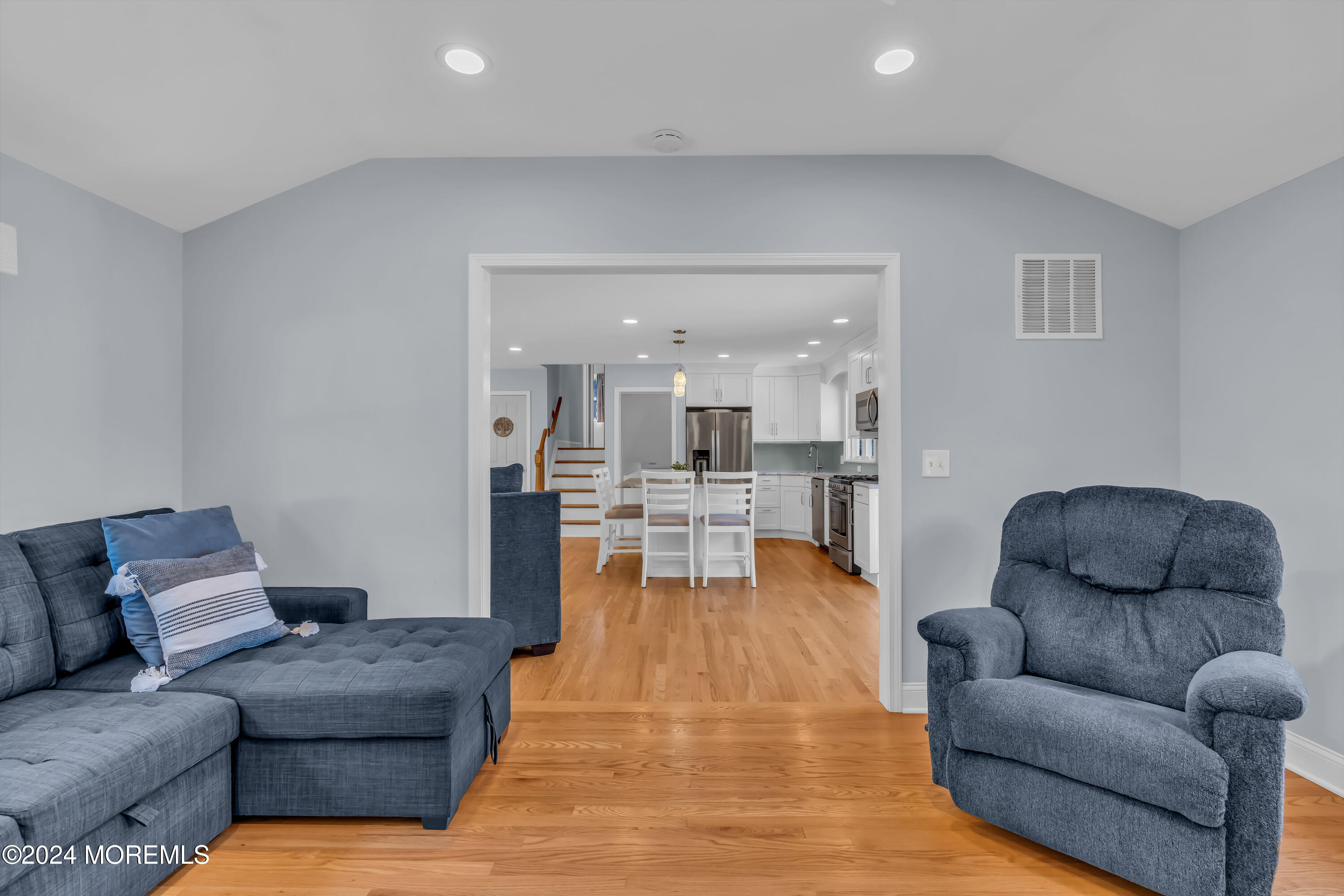 111 Remsen Mill Road Neptune Township, NJ 07753 - Photo 25 of 80 a living room with furniture and a view of kitchen