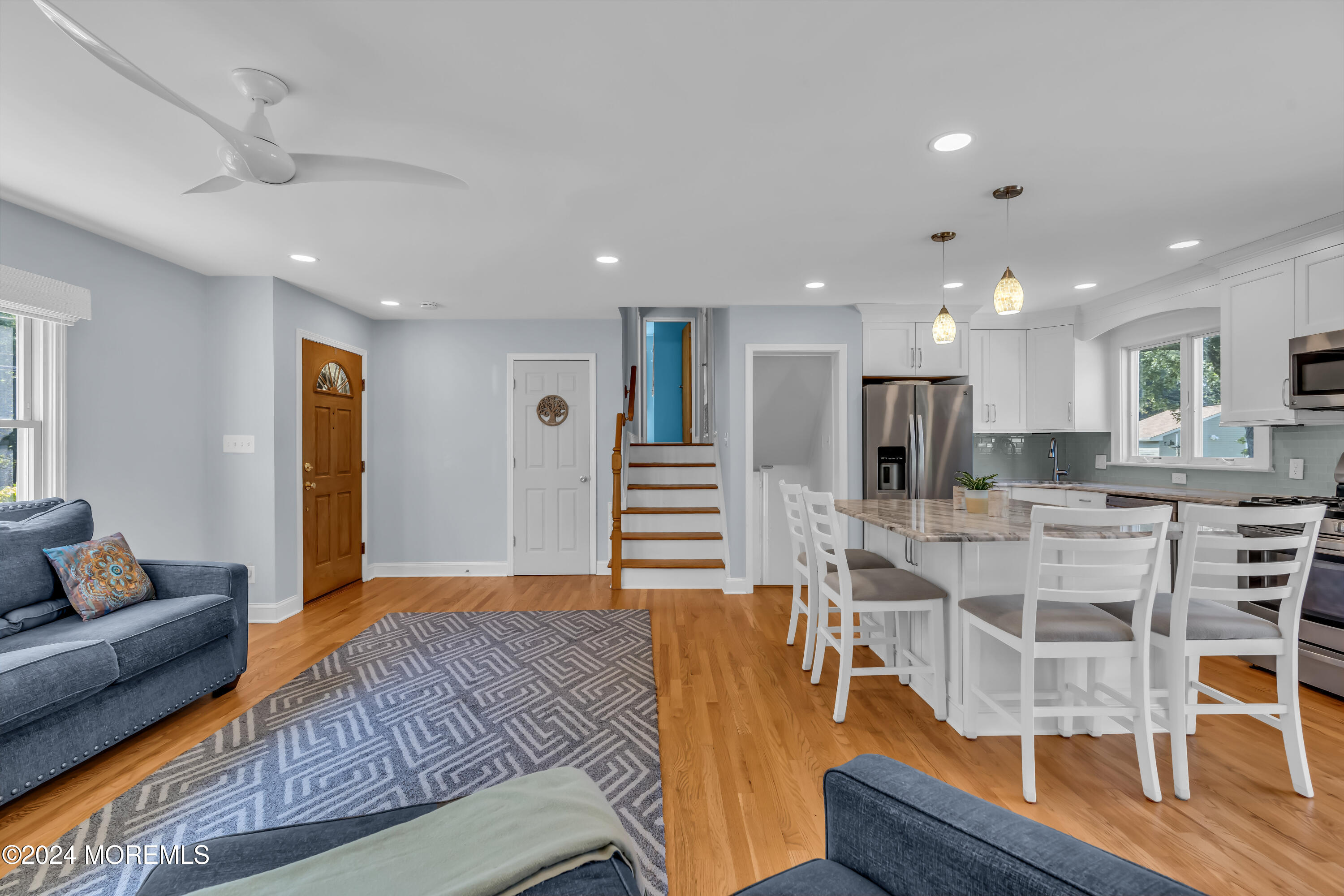 111 Remsen Mill Road Neptune Township, NJ 07753 - Photo 27 of 80 a living room with furniture and kitchen view with wooden floor