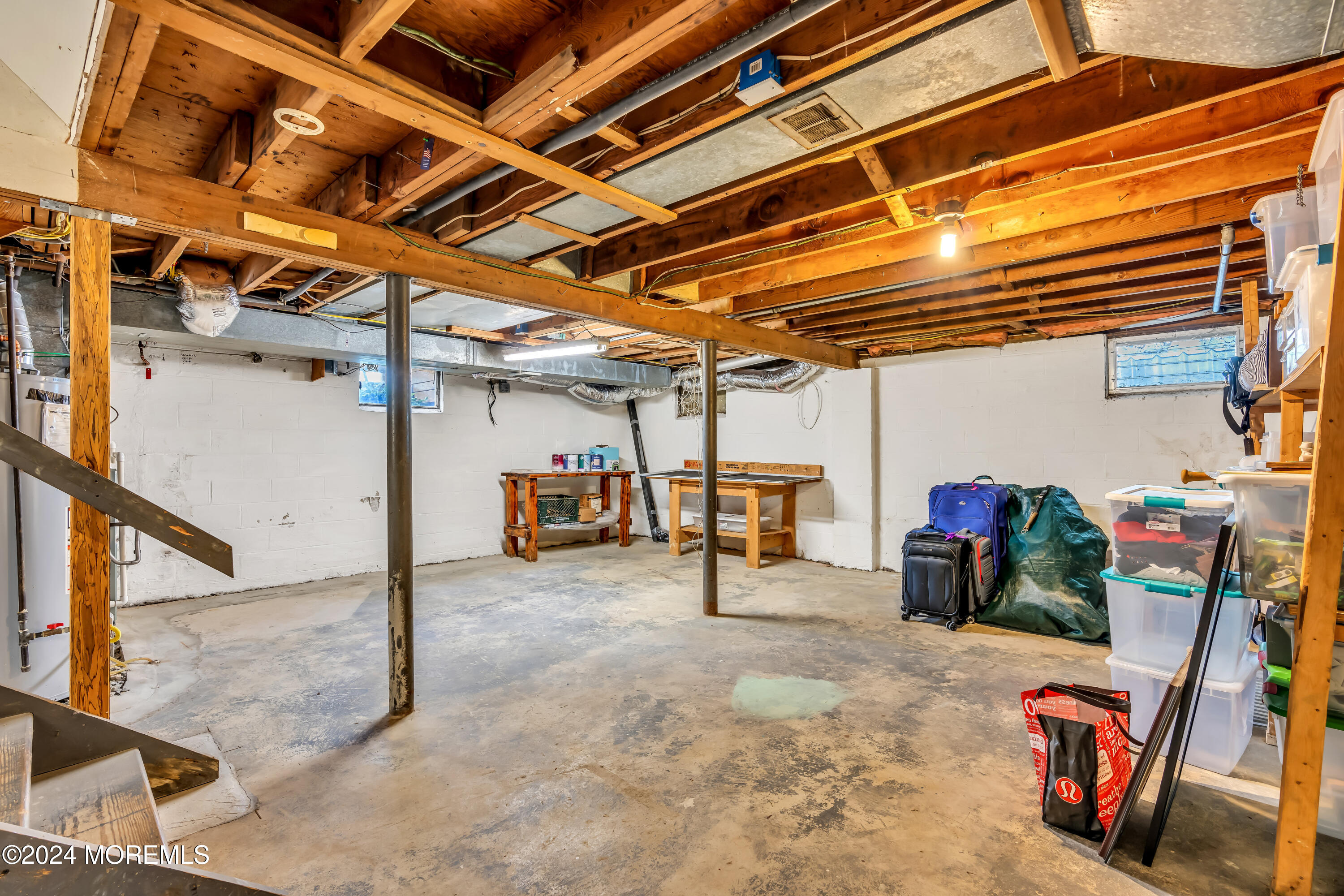 111 Remsen Mill Road Neptune Township, NJ 07753 - Photo 48 of 80 a view of a storage room with shelves