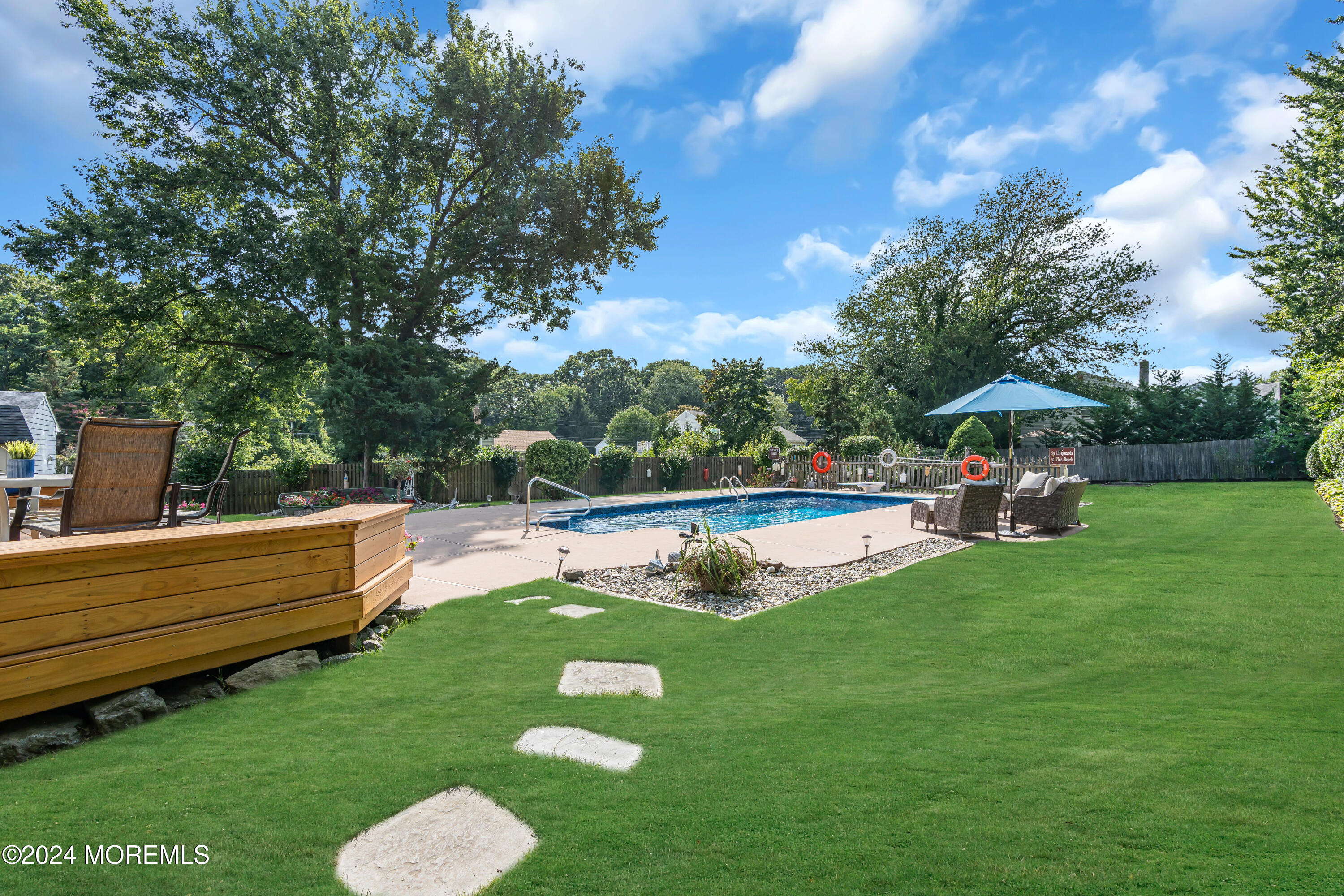 111 Remsen Mill Road Neptune Township, NJ 07753 - Photo 62 of 80 a view of a house with swimming pool and a yard