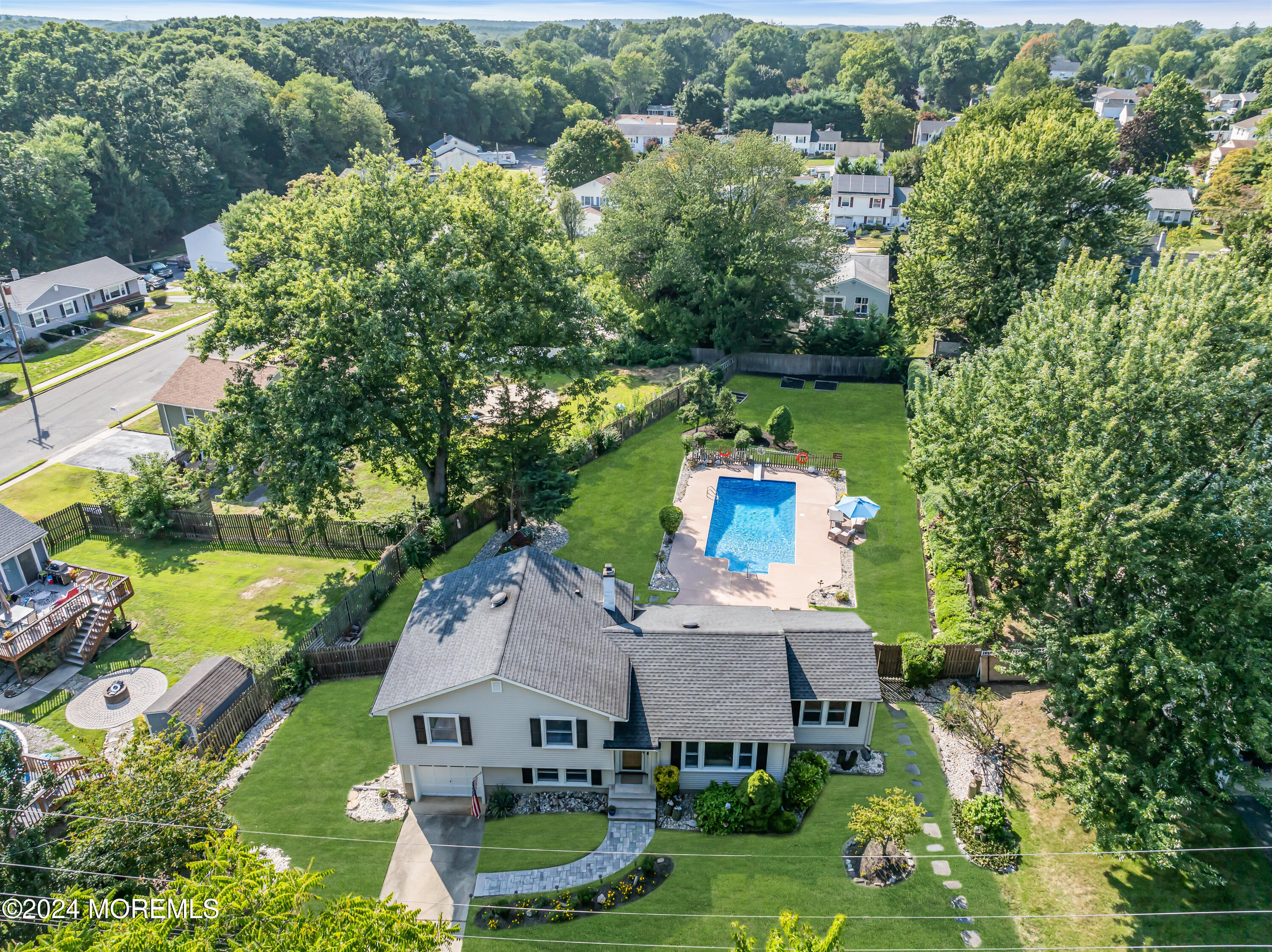 111 Remsen Mill Road Neptune Township, NJ 07753 - Photo 72 of 80 an aerial view of a house with a garden and lake view