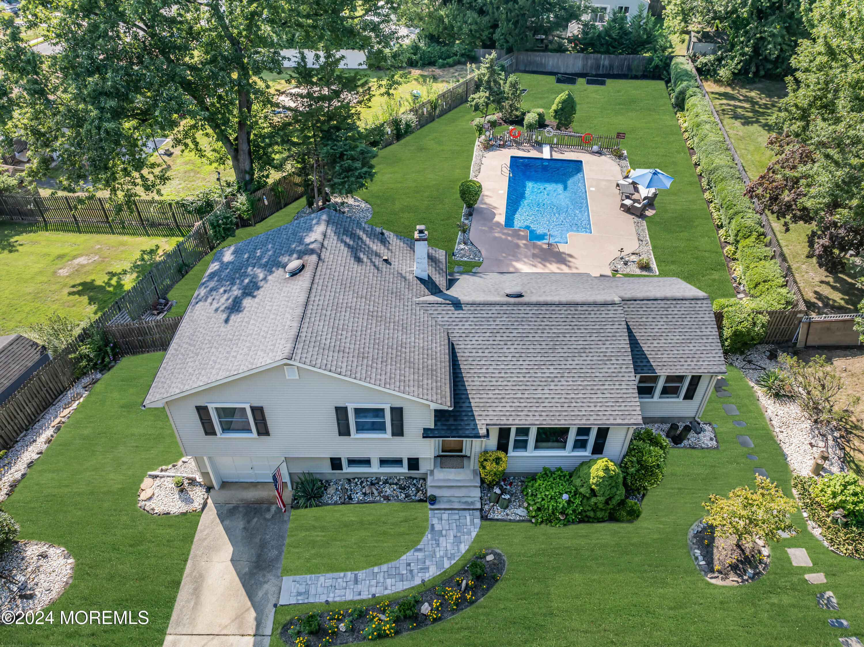 111 Remsen Mill Road Neptune Township, NJ 07753 - Photo 74 of 80 an aerial view of a house with swimming pool garden and patio