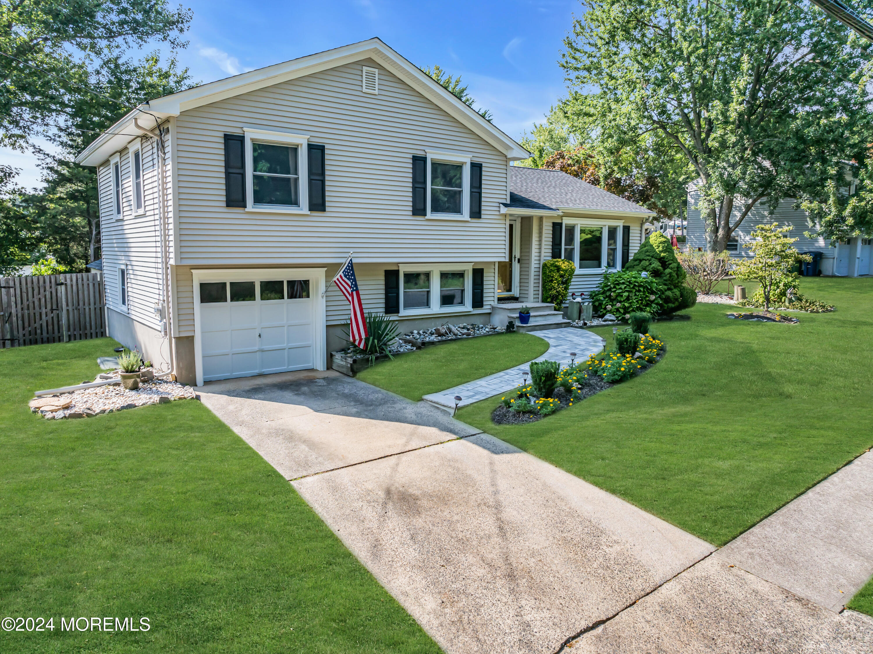 111 Remsen Mill Road Neptune Township, NJ 07753 - Photo 75 of 80 a front view of a house with a yard