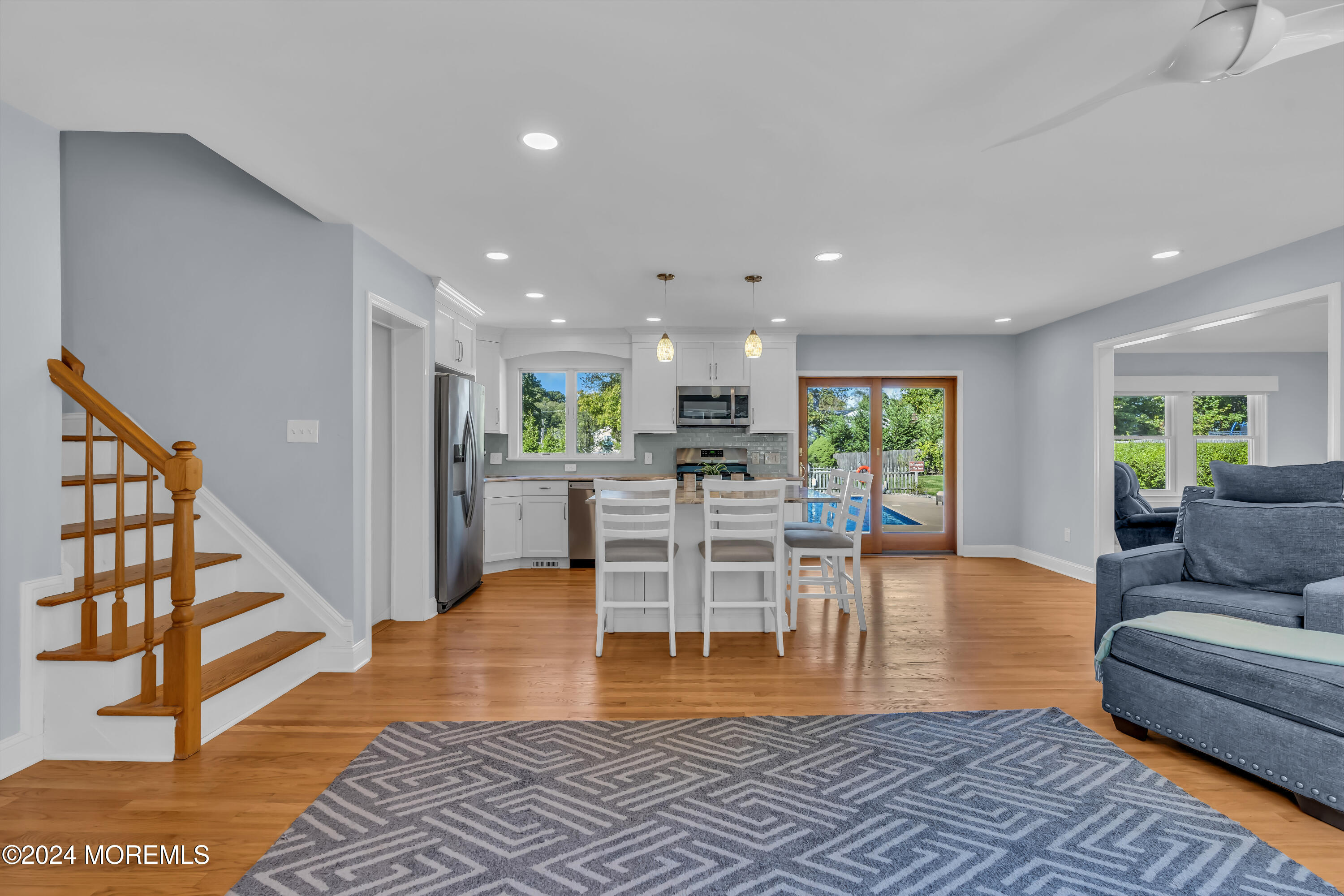 111 Remsen Mill Road Neptune Township, NJ 07753 - Photo 9 of 80 a living room with furniture a wooden floor and next to a window