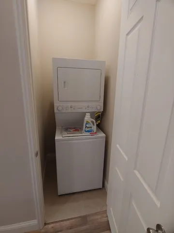a kitchen with a sink stove and microwave