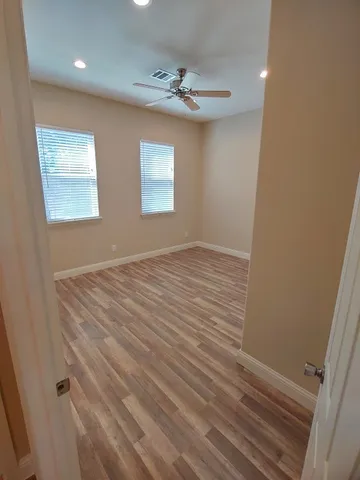 en empty room with windows