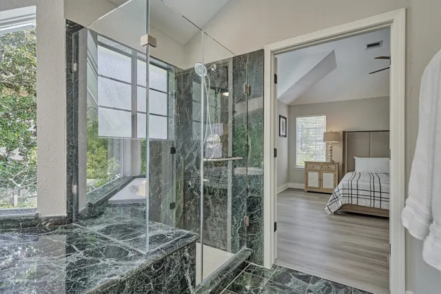 a view of house with swimming pool outdoor seating