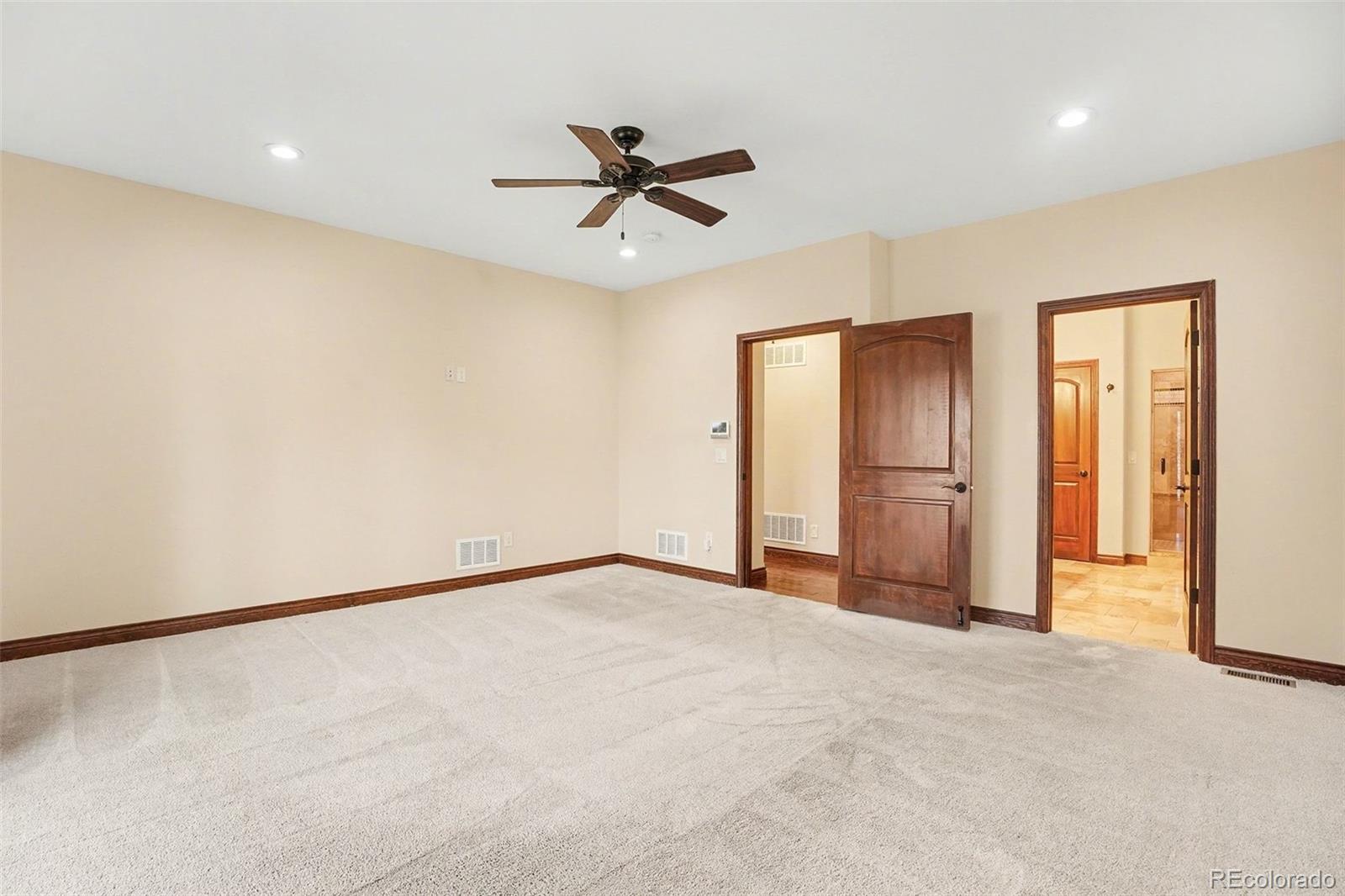 7936 Monarch Road Larkspur, CO 80118 - Photo 11 of 24 a view of an empty room