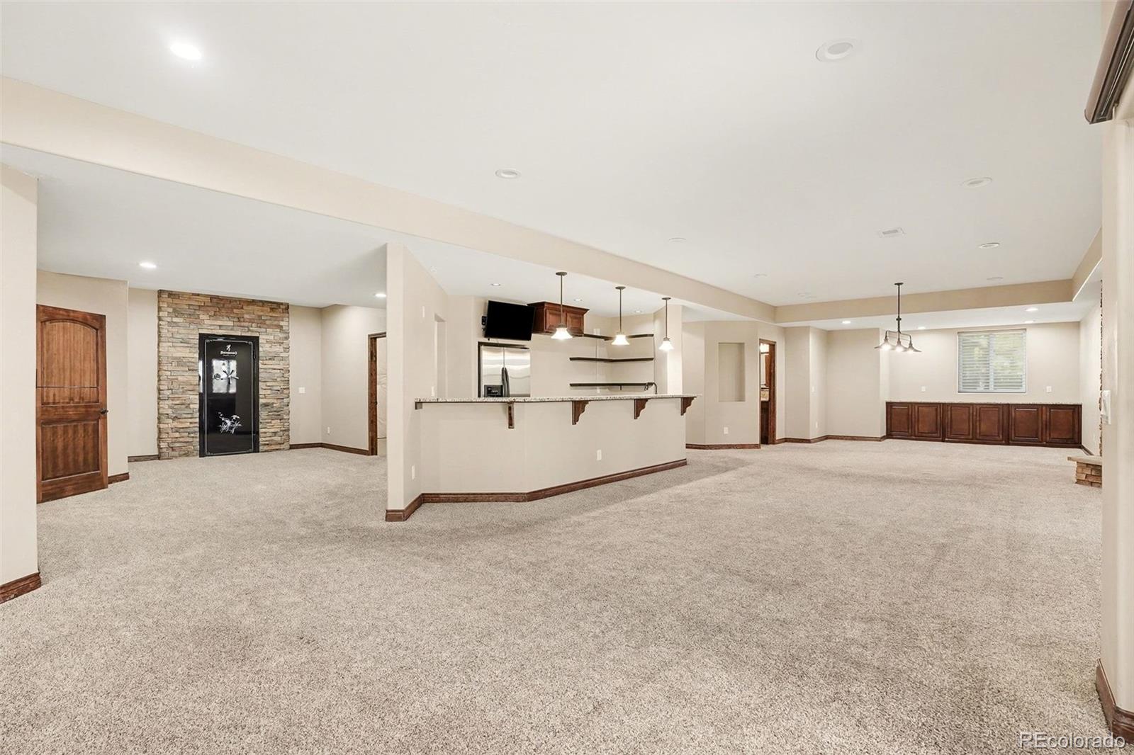 7936 Monarch Road Larkspur, CO 80118 - Photo 19 of 24 a view of a kitchen with a sink and a refrigerator